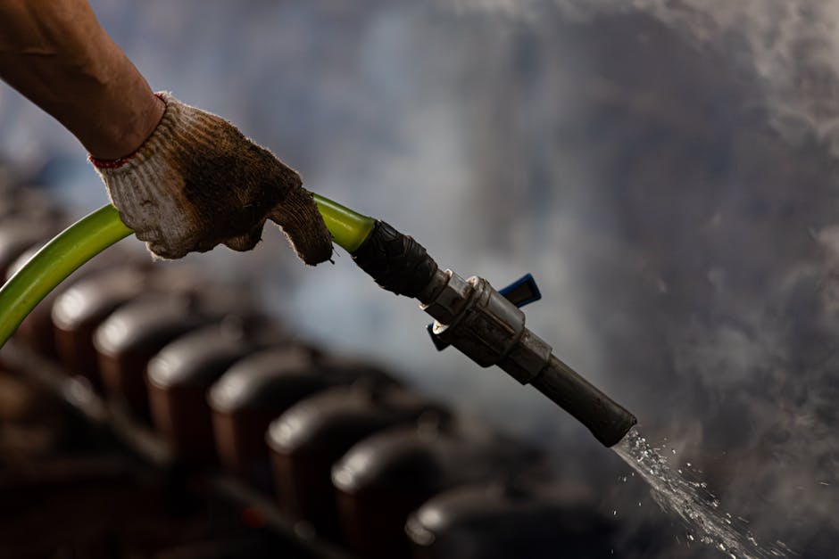 Travaux de plumber working pipes