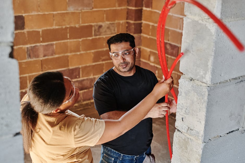 Travaux de plumber working pipes