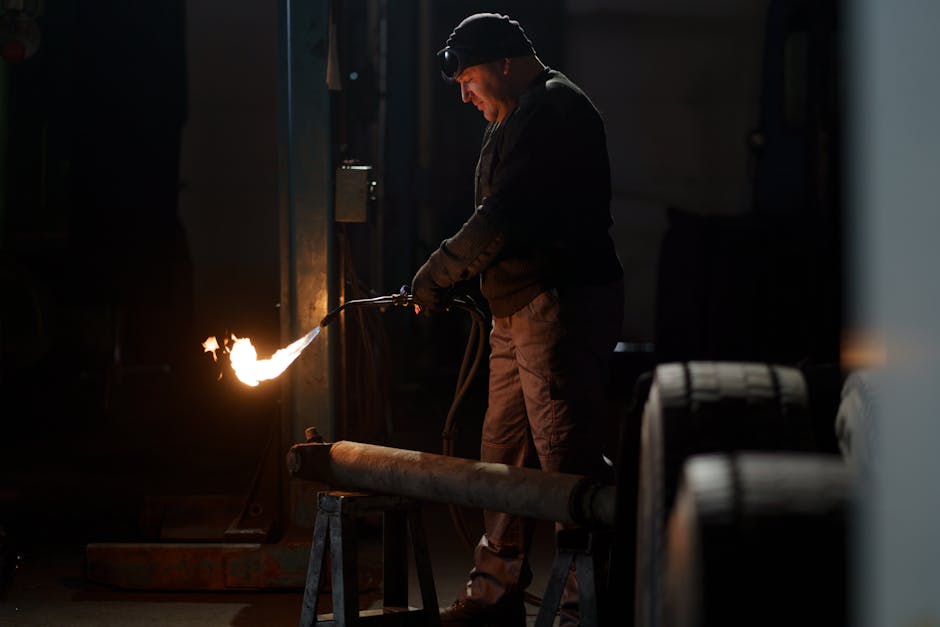 Travaux de plumber working pipes